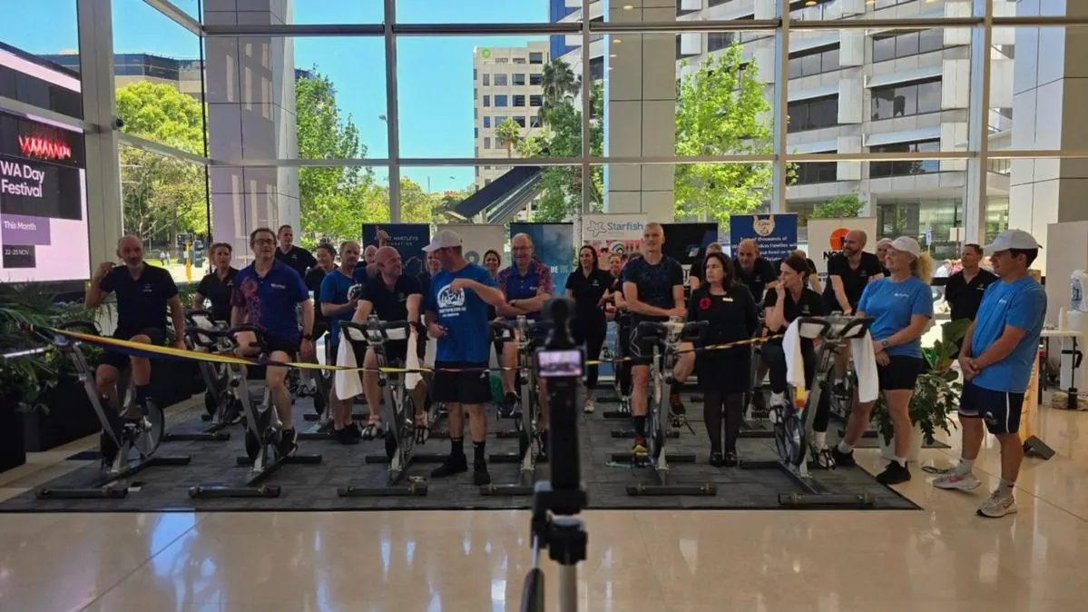Riders on spin bikes at the Motivate Ultra Charity Spin in Perth