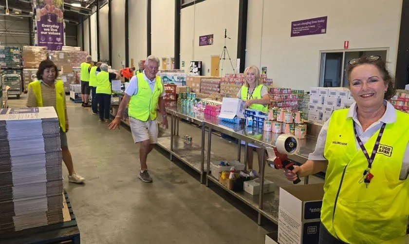 Volunteers on the hamper packing line at Foodbank WA